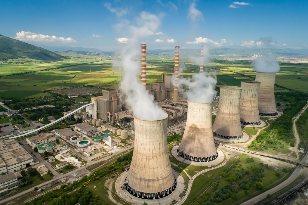 Aerial view the plant producing electrical energy with large pipes at Kozani in northern Greece.