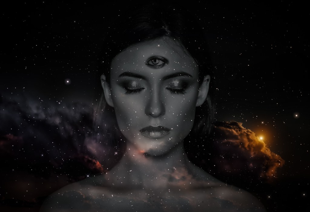 Woman with third eye on head - supernatural sense concept.