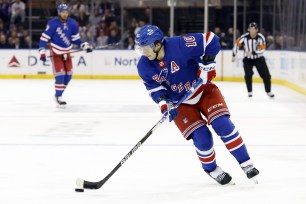 Artemi Panarin #10 of the New York Rangers controls the puck during the second period against the Columbus Blue Jackets.