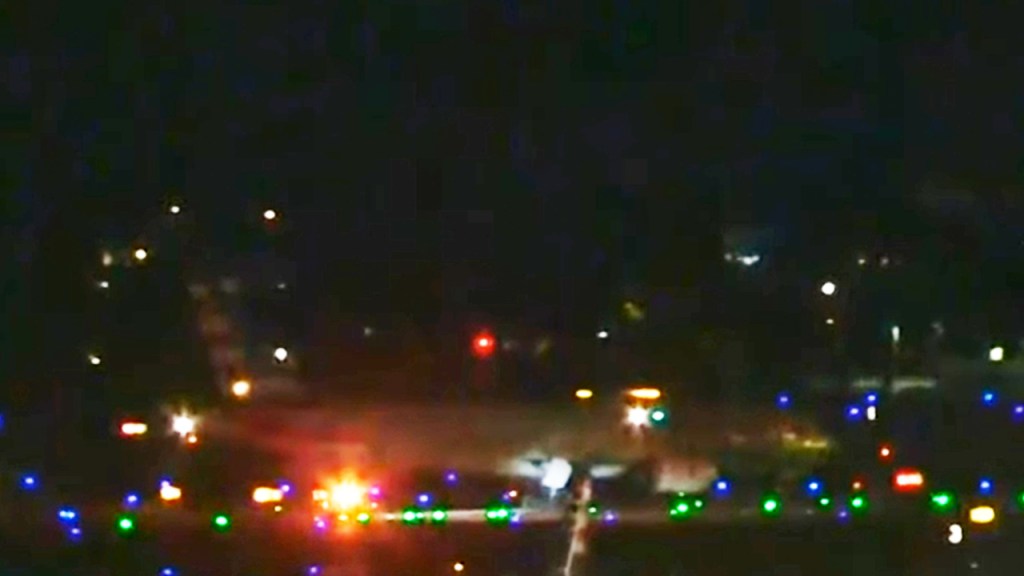 American Airlines flight 345 on the runway at LAX after making an emergency landing Wednesday evening.