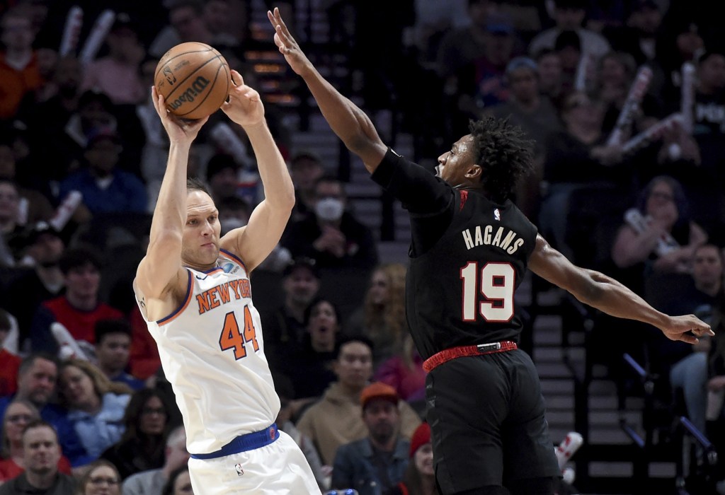 Bojan Bogdanovic, who scored five points, passes the ball as Ashton Hagans defends during the Knicks' win.