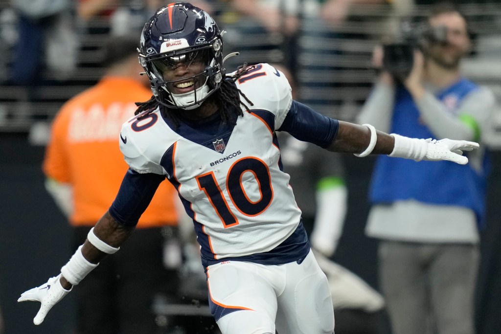 Denver Broncos wide receiver Jerry Jeudy (10) celebrates after scoring against the Las Vegas Raiders during an NFL football game, Sunday, Jan. 7, 2024, in Las Vegas.