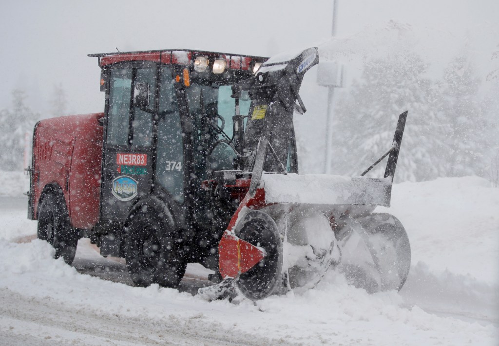 snowblower removes snow from the circle at Truckee Way and Jibboom Street in Truckee, Calif., on Friday, March 1, 2024.