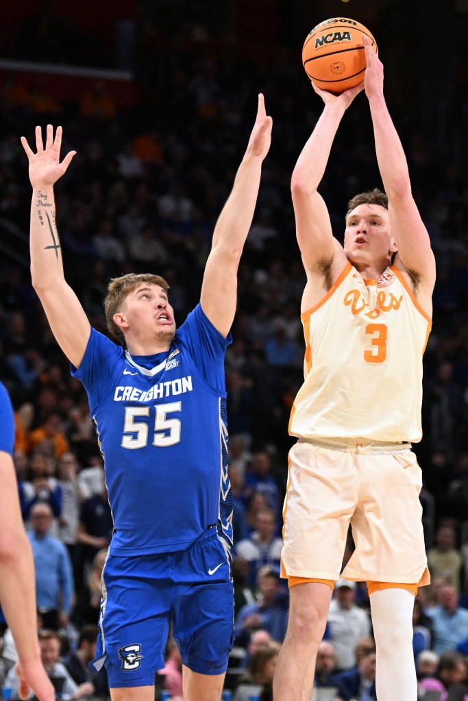 Dalton Knecht shoots over Baylor Scheierman during Tennessee's Sweet 16 victory.