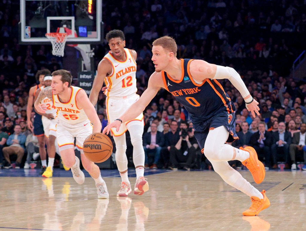 Donte DiVincenzo, who scored a team-high 21 points, drives up the court during the Knicks' loss.