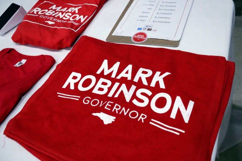 Campaign merchandise is for sale asNorth Carolina Lt. Gov. Mark Robinson, a Republican candidate for North Carolina governor, holds a rally Friday, Jan. 26, 2024, in Roxboro, N.C.