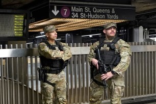 Members of the New York National patrol the subway at Grand Central Terminal on March 7, 2024.