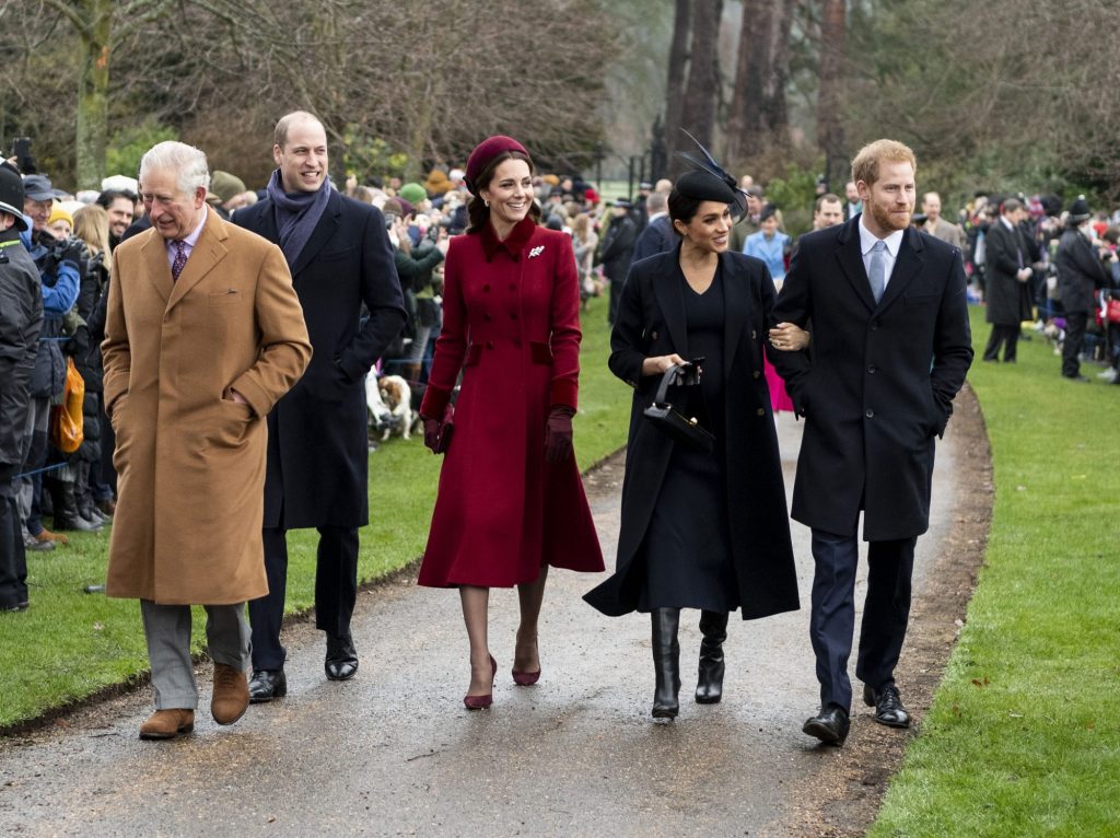 The Royal Family walking on a path to attend Christmas Day Church service at Church of St Mary Magdalene on the Sandringham estate.