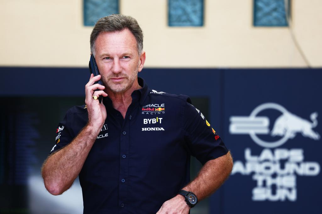 Red Bull Racing Team Principal Christian Horner talks on the phone prior to practice ahead of the F1 Grand Prix of Bahrain on February 29, 2024.