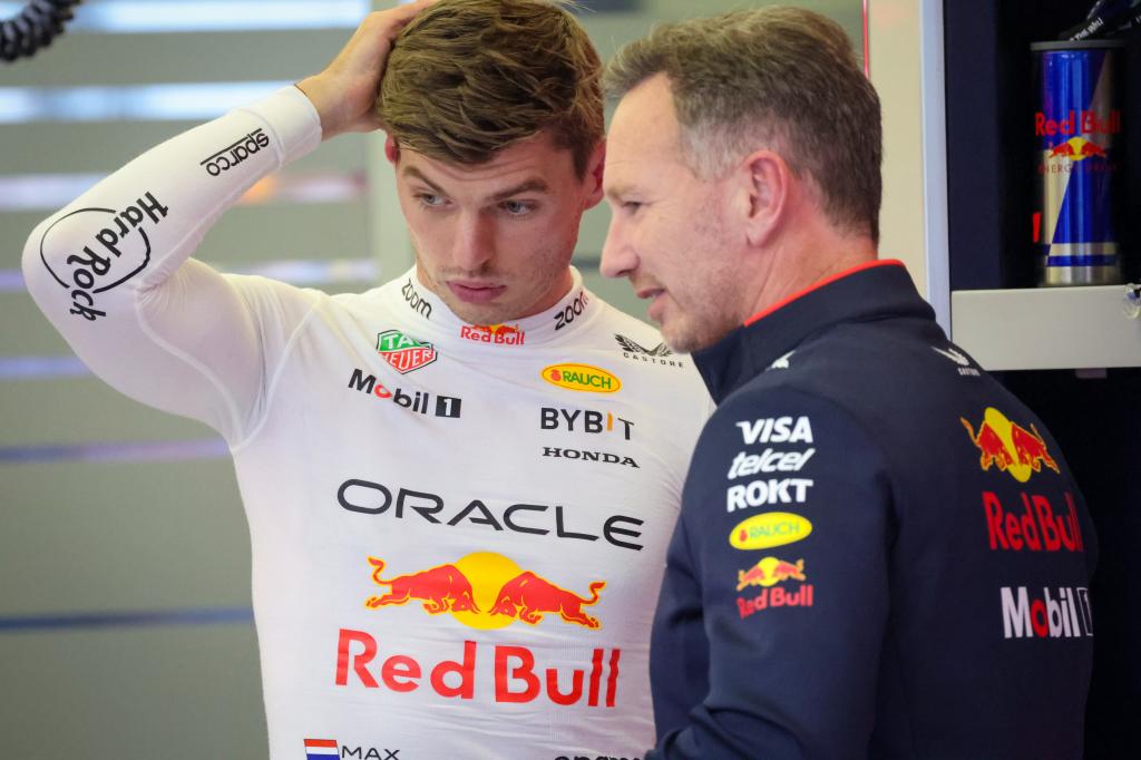 Max Verstappen talks with Christian Horner in the garage during final practice ahead of the F1 Grand Prix of Bahrain on March 1, 2024 in Bahrain.