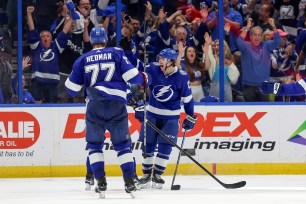 ESPN BET promo code graphic featuring Tampa Bay Lightning players.