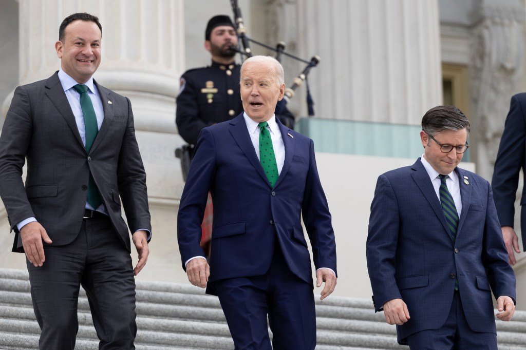  Irish Taoiseach Leo Varadkar, U.S. President Joe Biden and Speaker of the House Mike Johnson (R-LA) walk down the east steps of the House of Representatives at the U.S. Capitol on March 15, 2023