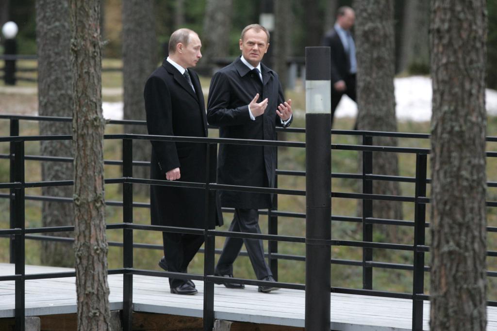 Russian Prime Minister Vladimir Putin and Tusk visit a memorial site for the 70th anniversary of the Katyn massacre on April 7, 2010 in Katyn, Russia. 