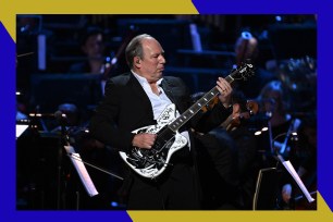 Hans Zimmer shreds on guitar in concert.