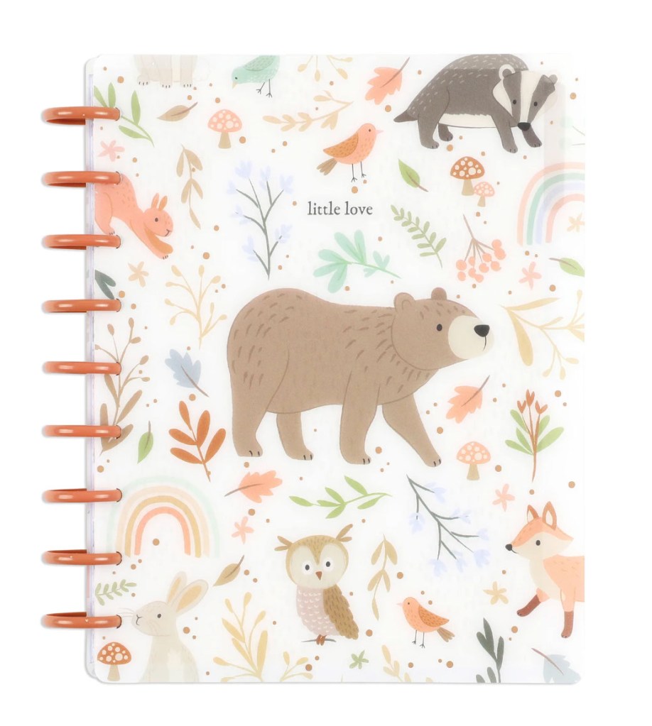 A whimsical baby photo journal with guided pages and dividers, featuring animals, available for $35 at TheHappyPlanner.com.