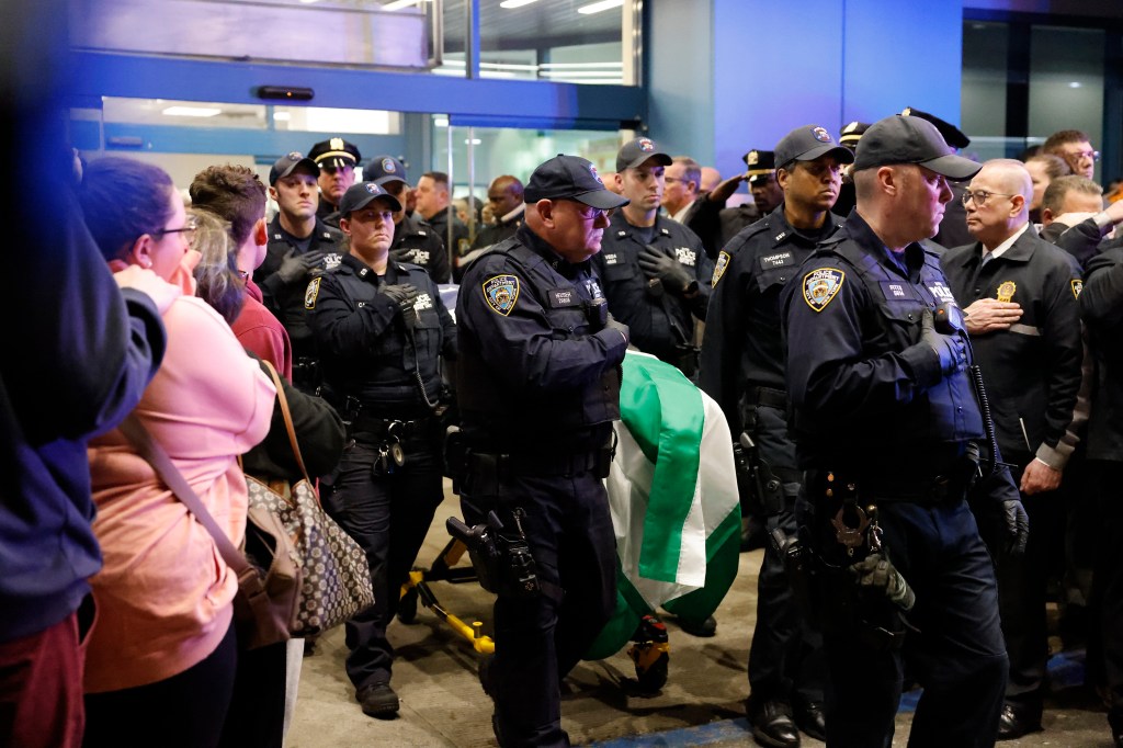 More NYPD presence can be seen, as they honor fellow officer Jonathan Diller. 