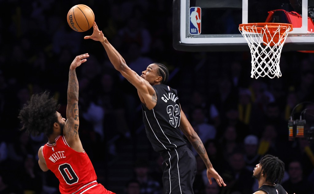 Nic Claxton blocks Coby White's shot during the Nets' 125-108 loss to the Bulls.