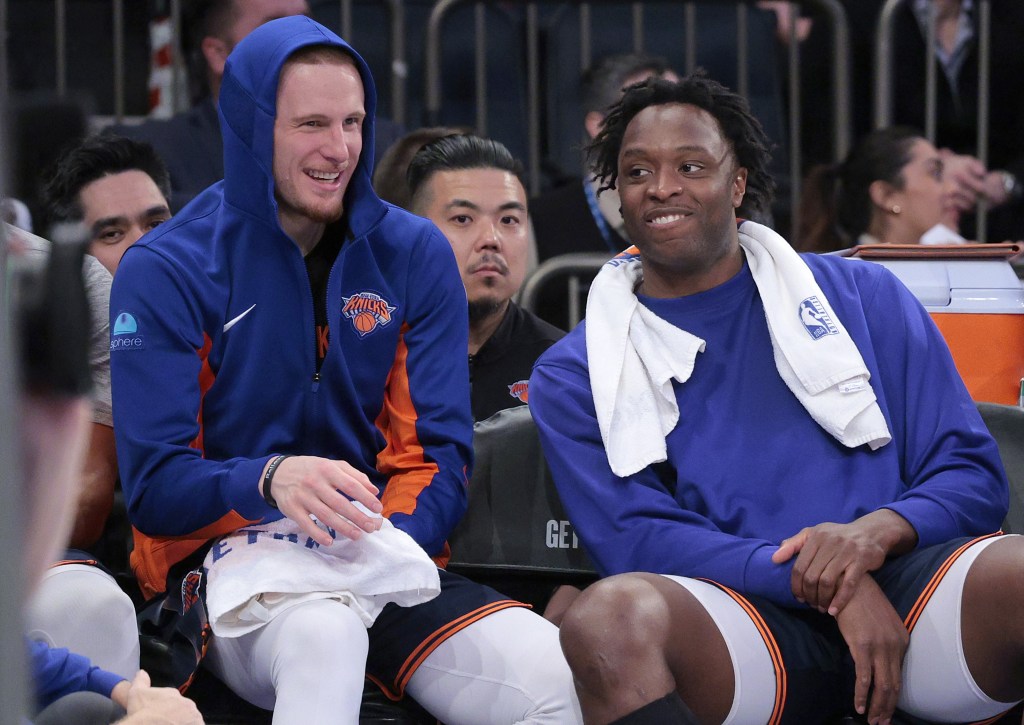 OG Anunoby (left) shares a laugh with Donte DiVincenzo during the Knicks' win over the 76ers. 