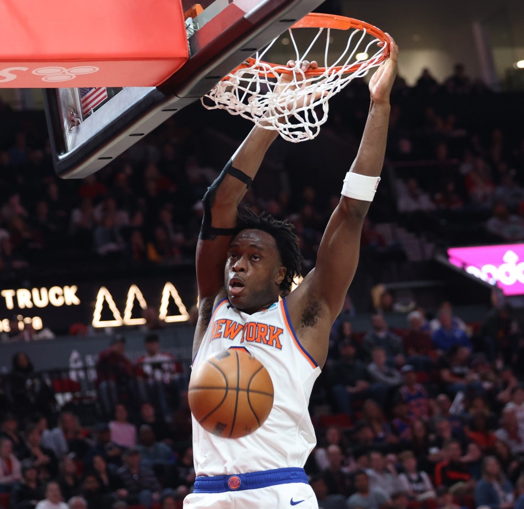 OG Anunoby slams home a dunk during the Knicks' win. 