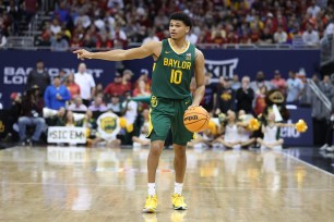 Baylor Bears guard RayJ Dennis (10) in the first half of a Big 12 tournament semifinal game between the Baylor Bears and Iowa State Cyclones.