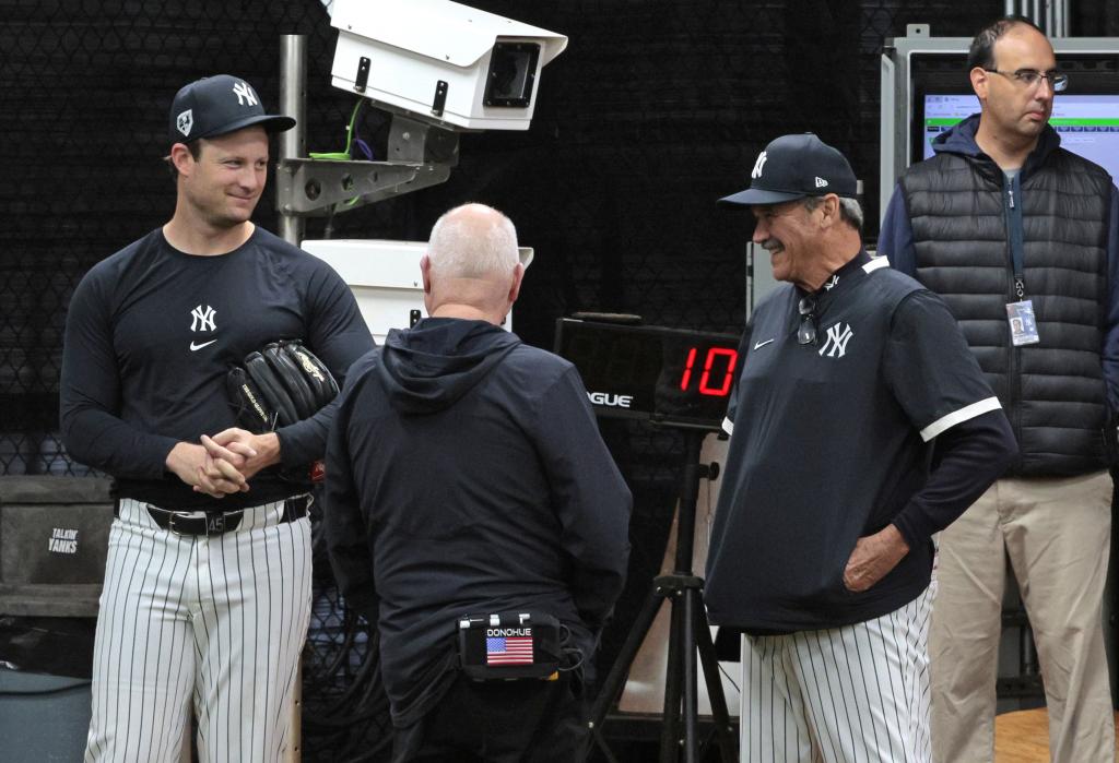 Gerrit Cole (left) shares a laugh with Ron Guidry (right) during a practice earlier in spring training.