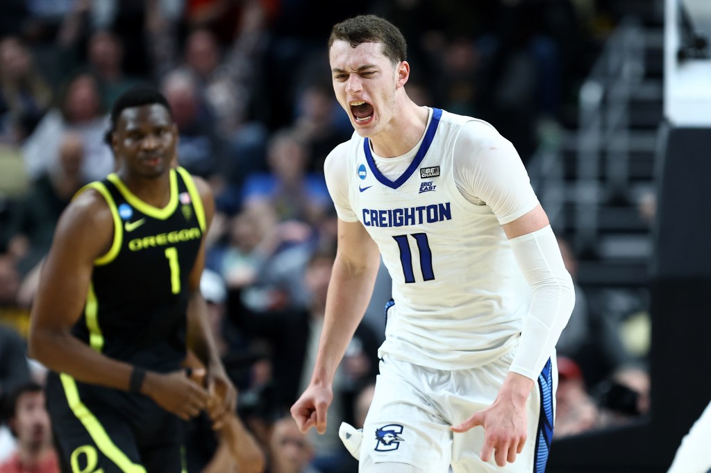 Ryan Kalkbrenner #11 of the Creighton Bluejays reacts after defeating the Oregon Ducks in a double overtime game 86-73 in the second round of the NCAA Men's Basketball Tournament.