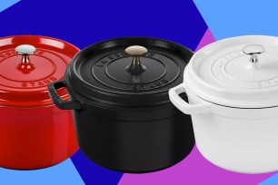 A group of Staub pots with lids.