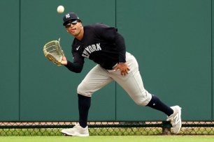 Trent Grisham, making a catch earlier in spring training, hit a two-run single in the Yankees 5-4 exhibition loss to the Mets.