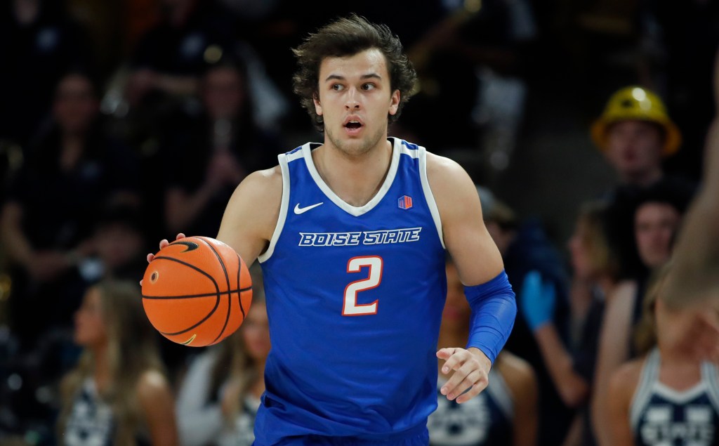 Tyson Degenhart #2 of the Boise State Broncos brings the ball up the court against the Utah State Aggies during the first half of their game at the Dee Glen Smith Spectrum on February 10, 2024 in Logan, Utah.