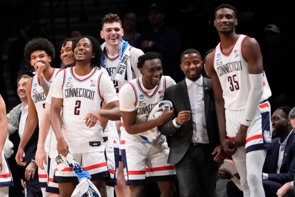 UConn players celebrate in the final second of their Round of 32 win over Northwestern.