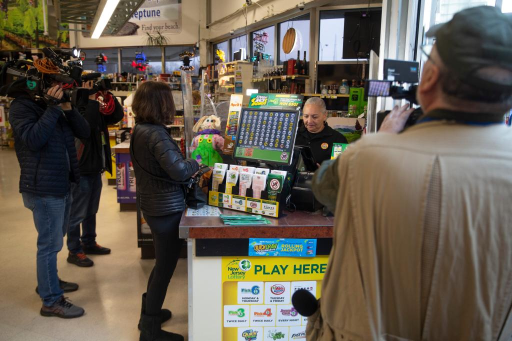 New Jersey Lottery Executive Director James Carey at ShopRite Liquor store in Neptune, announcing the sale of a $1.13 Billion Mega Millions Jackpot ticket