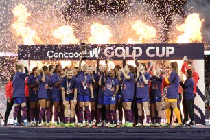 The United States Women's National Team celebrates their CONCACAF Gold Cup victory Sunday night in San Diego.