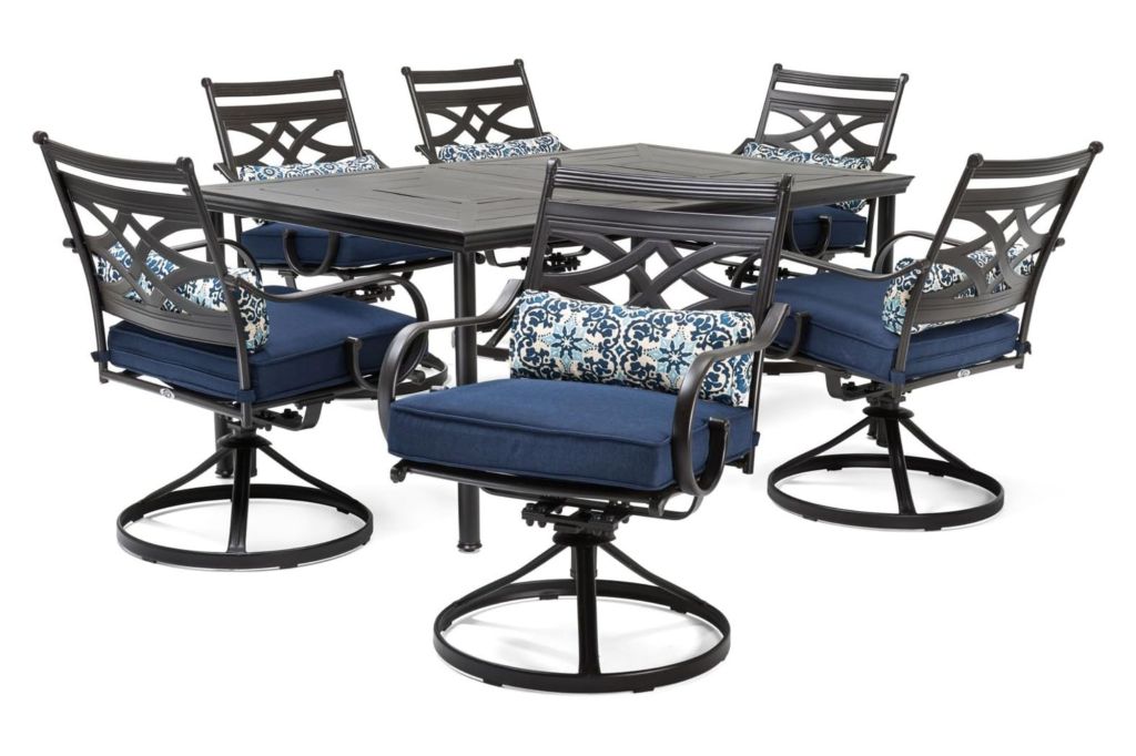 A outdoor table with six seats with cushions