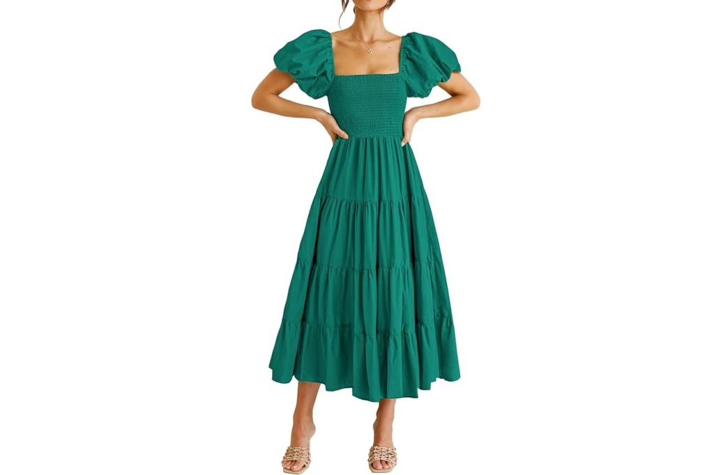 A woman in a green dress