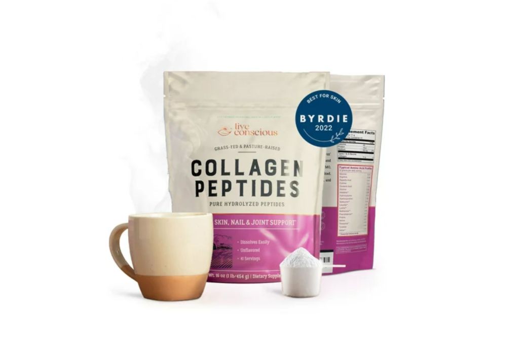 A bag of collagen alongside a cup of coffee.