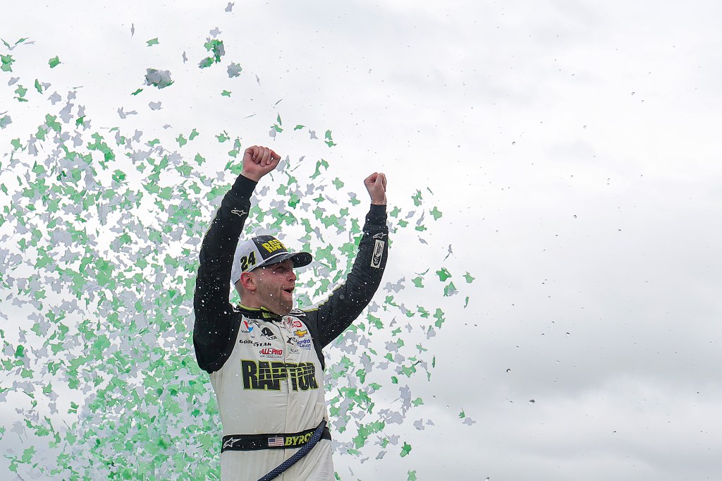 William Byron, driver of the #24 RaptorTough.com Chevrolet, celebrates in victory lane after winning the NASCAR Cup Series EchoPark Automotive Grand Prix at Circuit of The Americas.