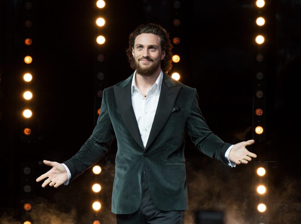 Aaron Taylor-Johnson in a suit at the European premiere of 'The Avengers: Age Of Ultron', rumored for James Bond role