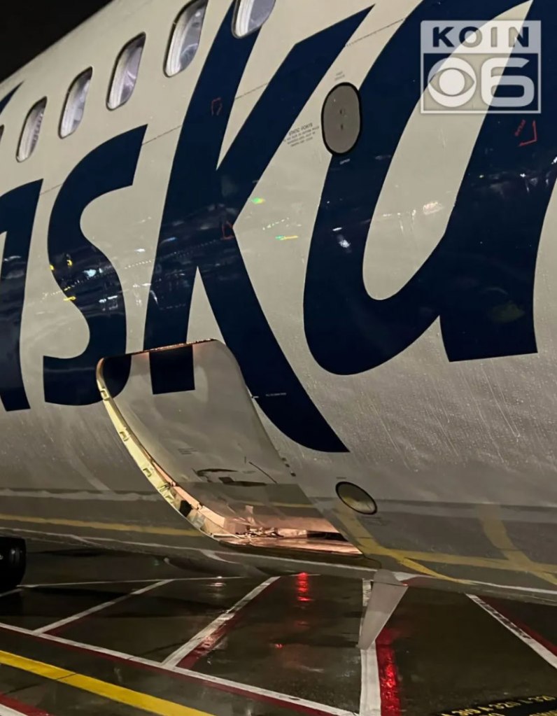 Embattled Alaska Airlines is at the center of a second aviation drama after a plane arrived at an airport gate in Portland, Ore. with its cargo door open. 