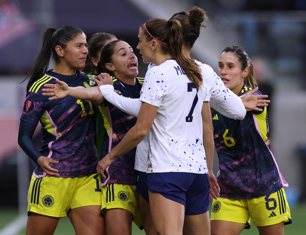 Alex Morgan #7 of United States confronts Maria Usme #11 and Carolina Arias #17 of Columbia during the quarterfinals 2024 Concacaf W Gold Cup at BMO Stadium on March 3, 2024 in Los Angeles, California.  