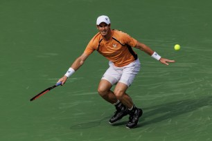 Andy Murray of Great Britain hits a forehand against David Goffin of Belgium in the first round of the BNP Paribas Open at Indian Wells Tennis Garden.