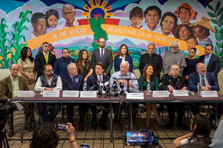 Ruben Garcia, center right, founder and director of Annunciation House, a network of migrants shelters in El Paso, Texas, speaks during a news conference accompanied by local representatives and members of the border community, Friday, Feb. 23, 2024.