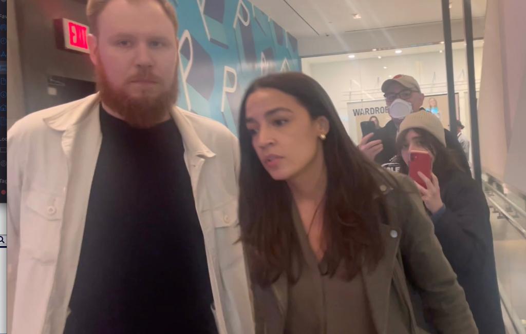 AOC confronted by protestors in NYC demanding response to Israel's military actions in Gaza. Credit: FNTV.