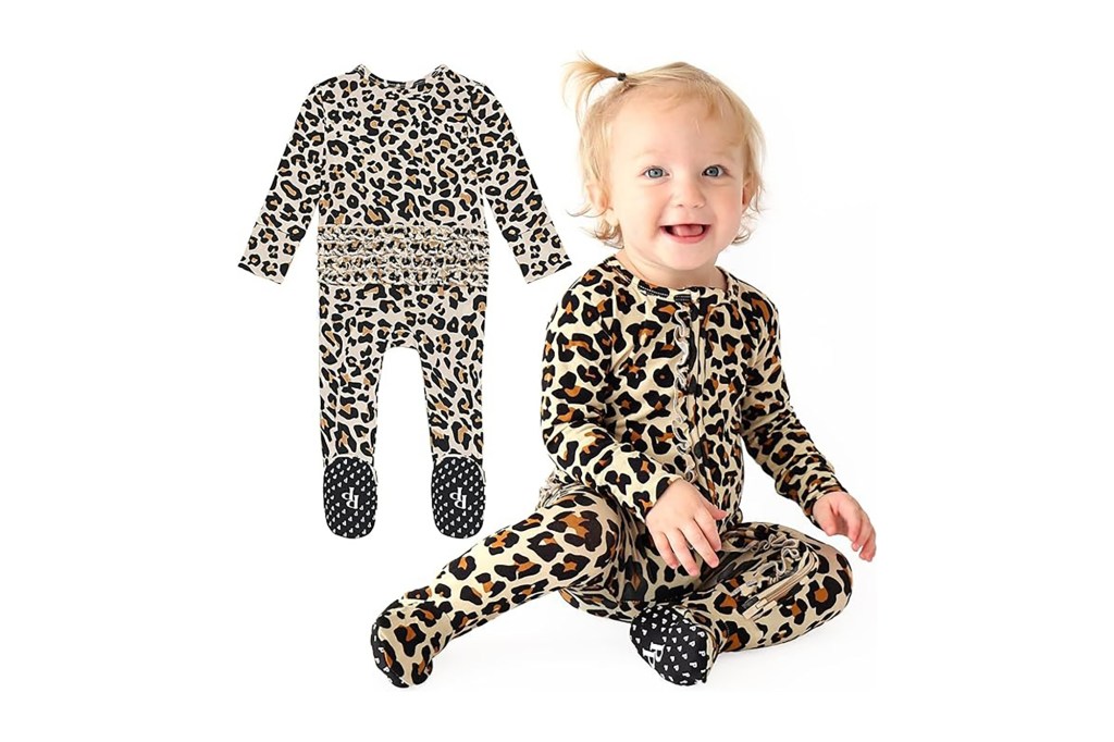 A baby in a leopard print outfit.