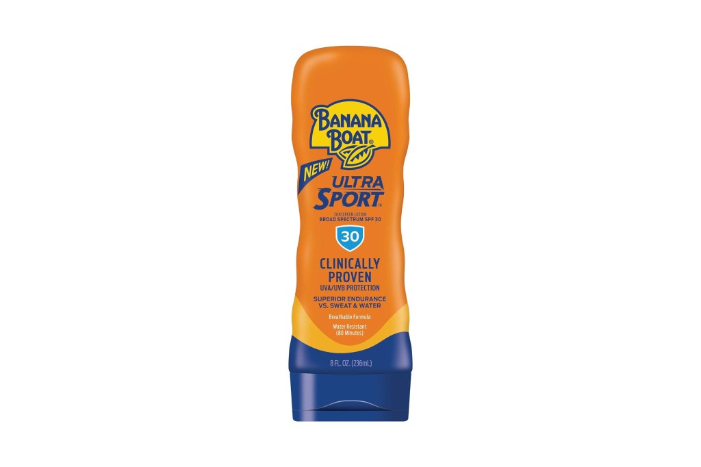 An orange bottle of sunscreen