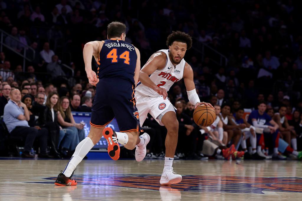 Cade Cunningham #2 of the Detroit Pistons in action against Bojan Bogdanovic #44 of the New York Knicks at Madison Square Garden on February 26, 2024 in New York City. The Knicks defeated the Pistons 113-111. 