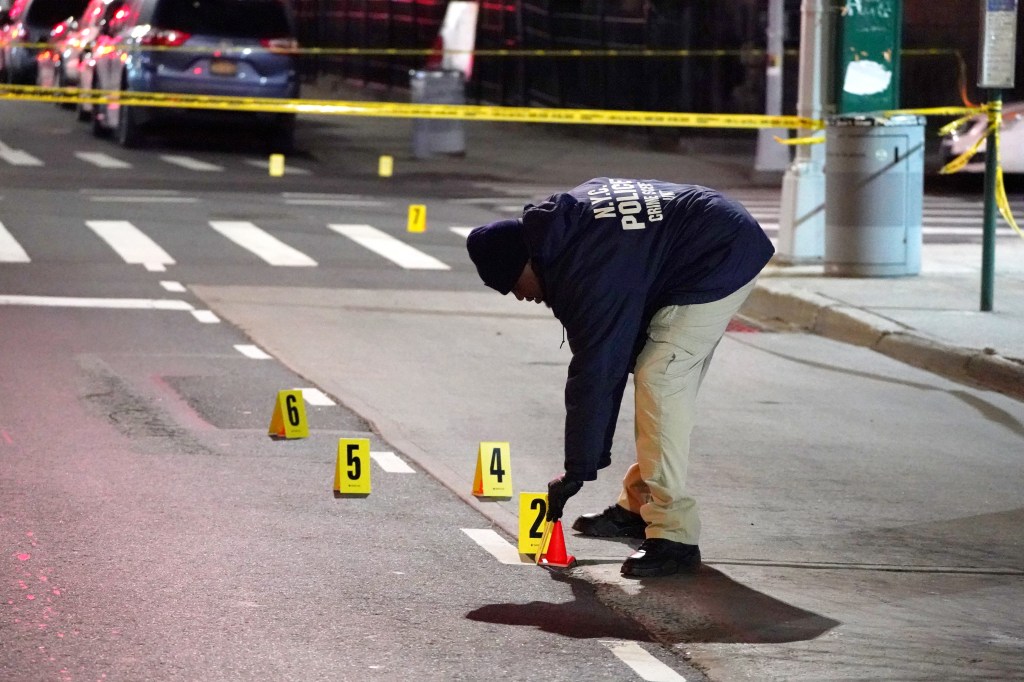 Six numbered evidence markers show where bullet casings were found after shooting.