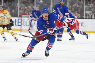 Braden Schneider #4 of the New York Rangers skates against the Boston Bruins at the TD Garden.