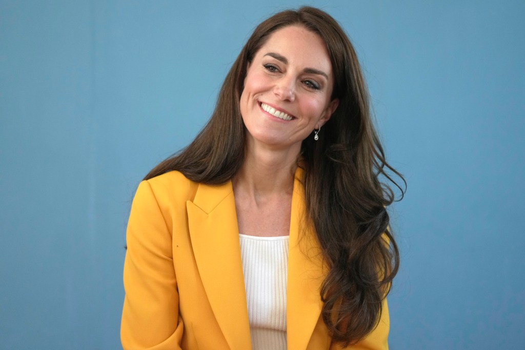 Britain's Kate, Princess of Wales, smiles as she visits the Dame Kelly Holmes Trust