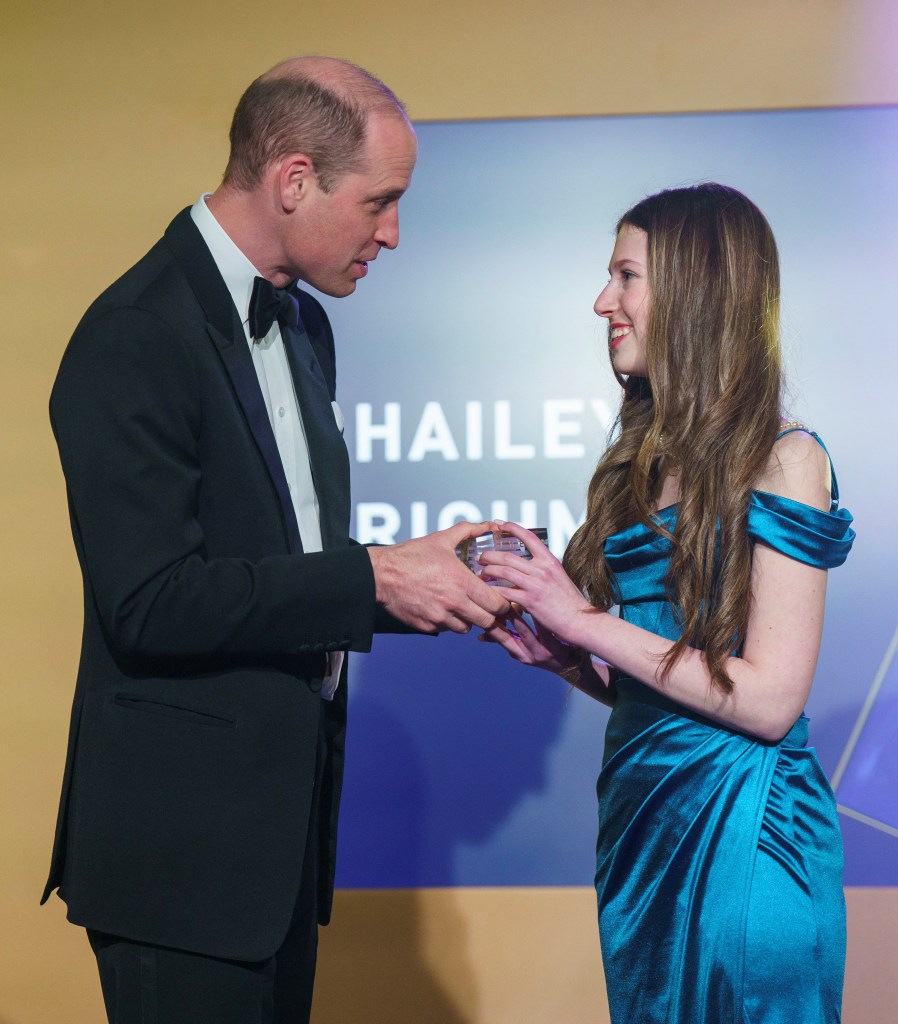 Britain's Prince William awards Hailey Richman from the U.S. during the Diana Legacy Awards at the Science Museum in London on March 14.