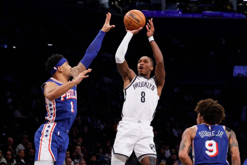 Brooklyn Nets guard Lonnie Walker IV shoots the ball against the 76ers on Tuesday night.